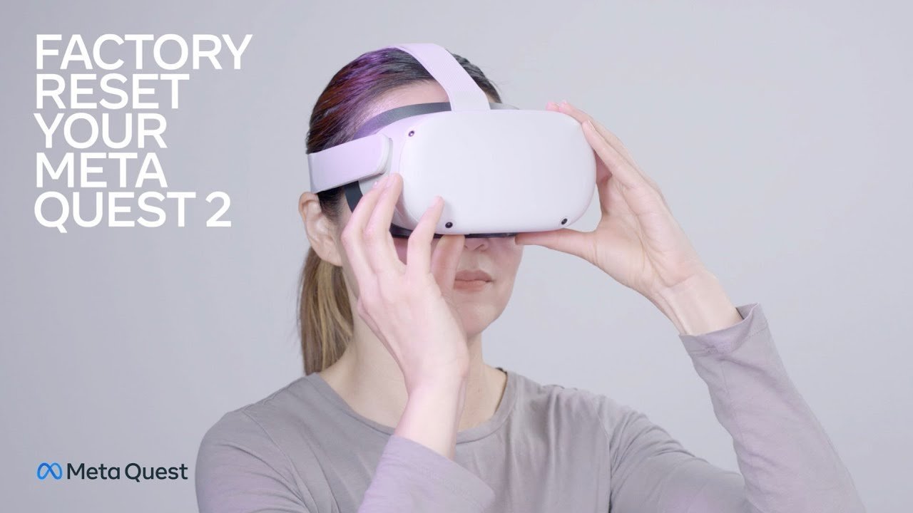 Hands pressing the power and volume buttons on a VR headset device.