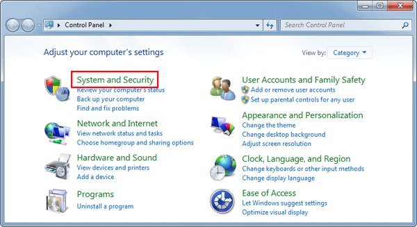 An older computer monitor showing a system recovery screen in a bright office.