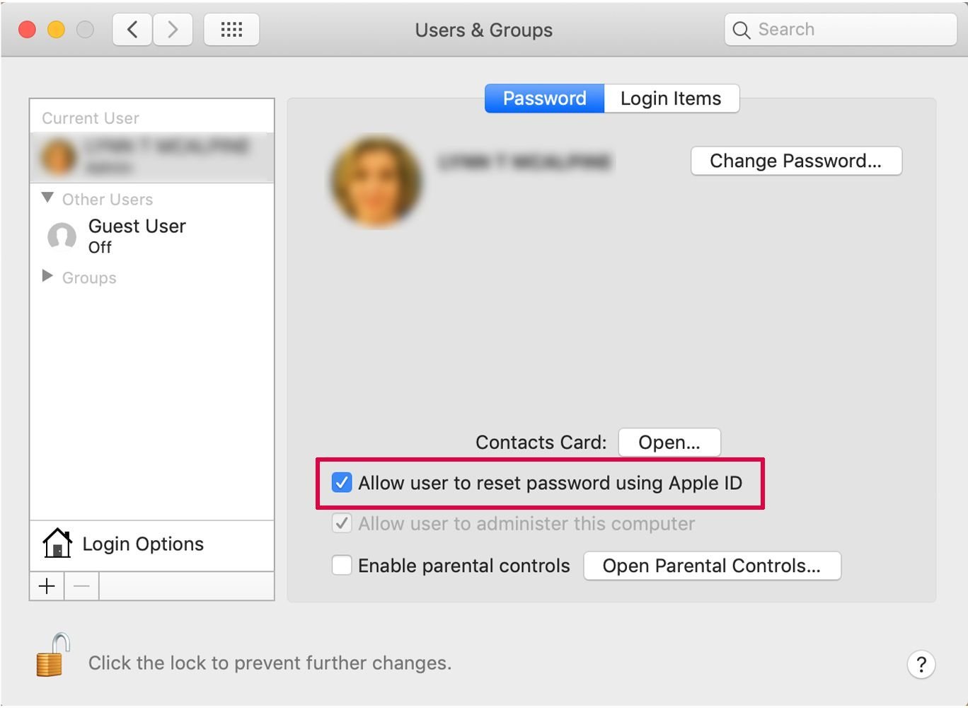 A wired keyboard and power cable prepared for a Mac admin password reset process.