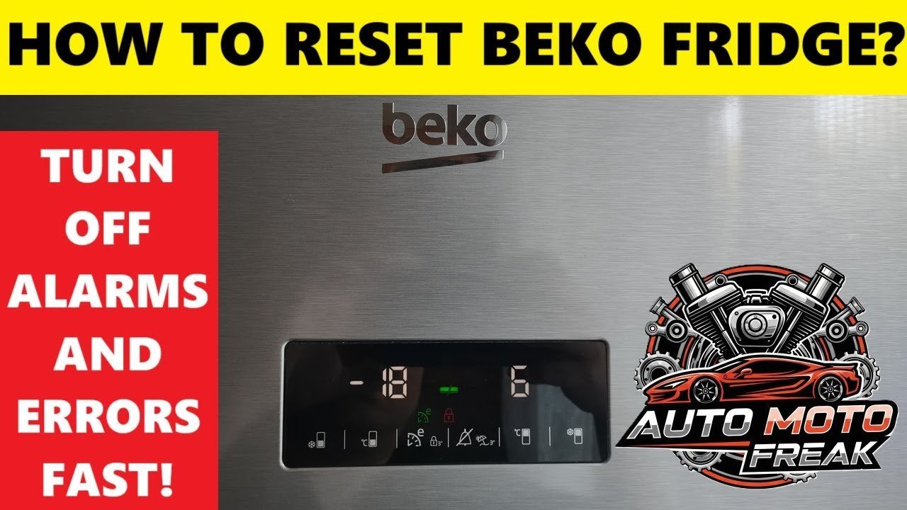 Close up of a digital Beko fridge control panel showing warning icons and settings.