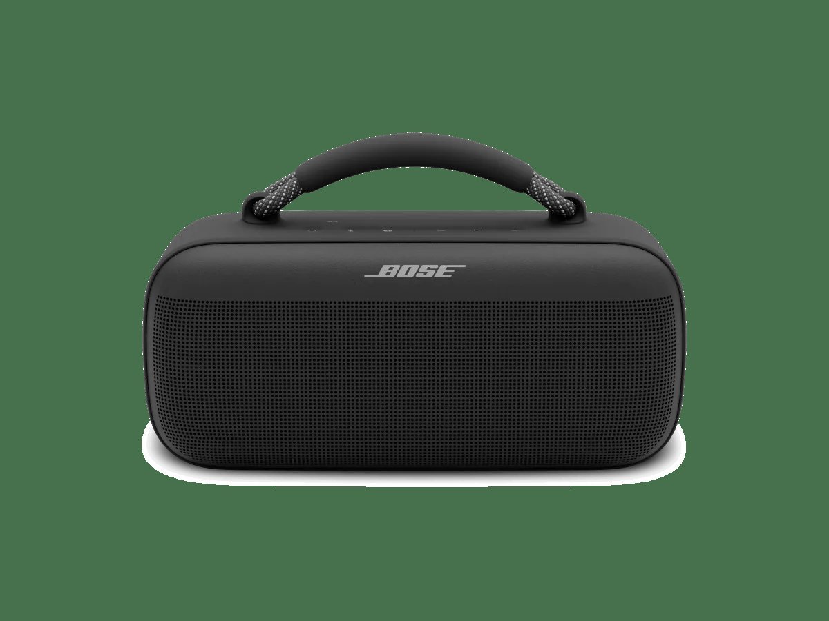 A person pressing the power button on a Bose speaker to begin resetting.
