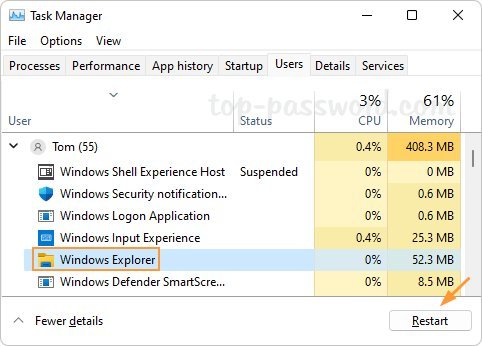 Close up of a person typing terminal commands to reset the Windows file explorer.