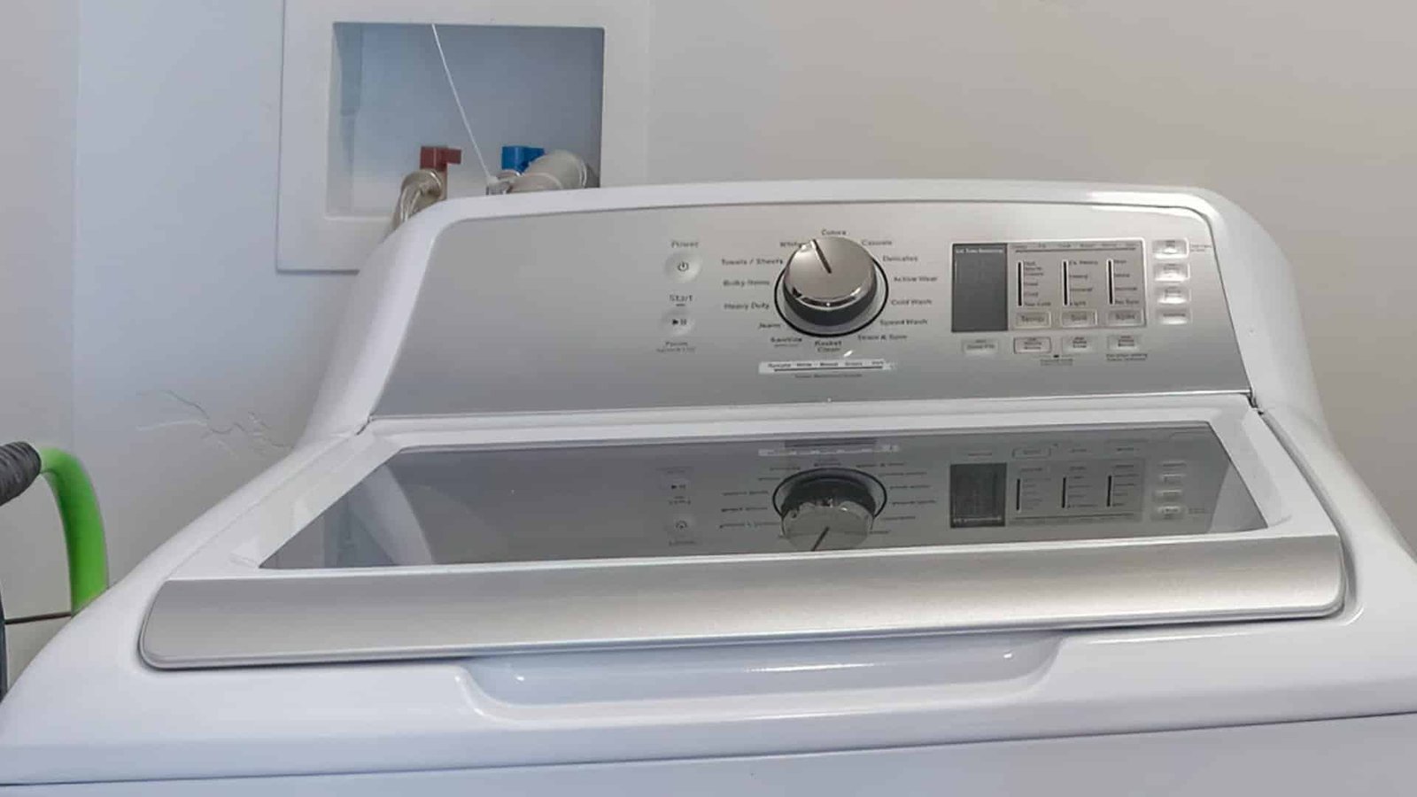 Essential tools for a top load washer reset including a timer and plug.