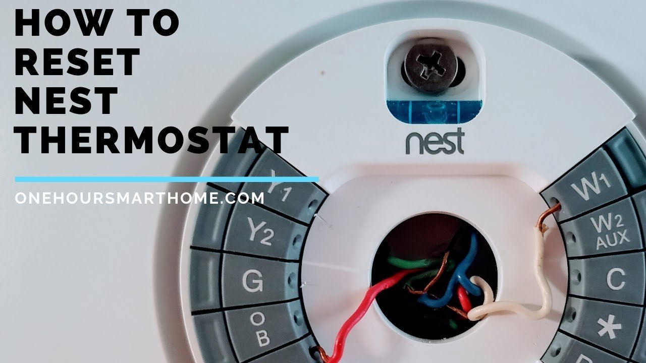 Preparation items for a thermostat reset including a phone and notes.