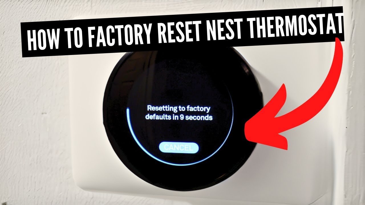 A hand interacting with a wall-mounted smart thermostat to adjust settings.