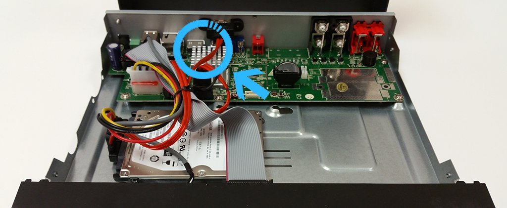 A collection of hardware components needed to reset a Night Owl DVR system.