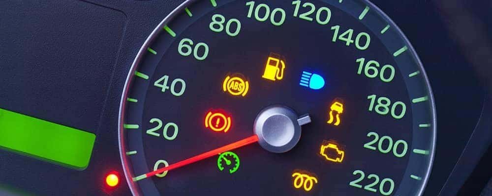 Modern car touchscreen interface used to clear maintenance indicators and oil warnings.