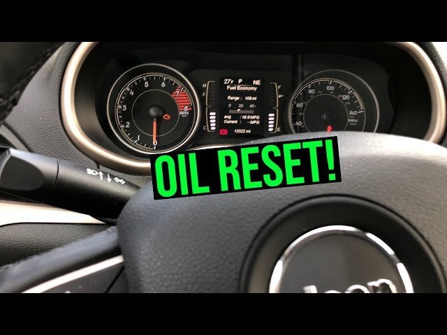 The modern dashboard and infotainment screen inside a Jeep Cherokee.