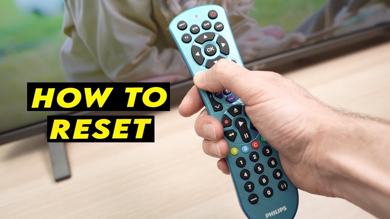 A smartphone with a remote control app sits next to a standard television remote.