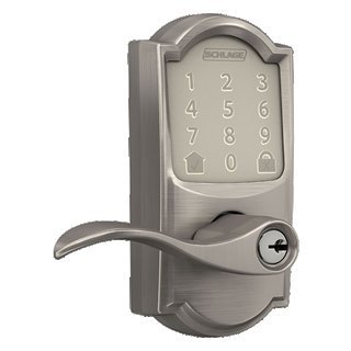 A user referencing digital instructions while preparing to reset their smart lock.