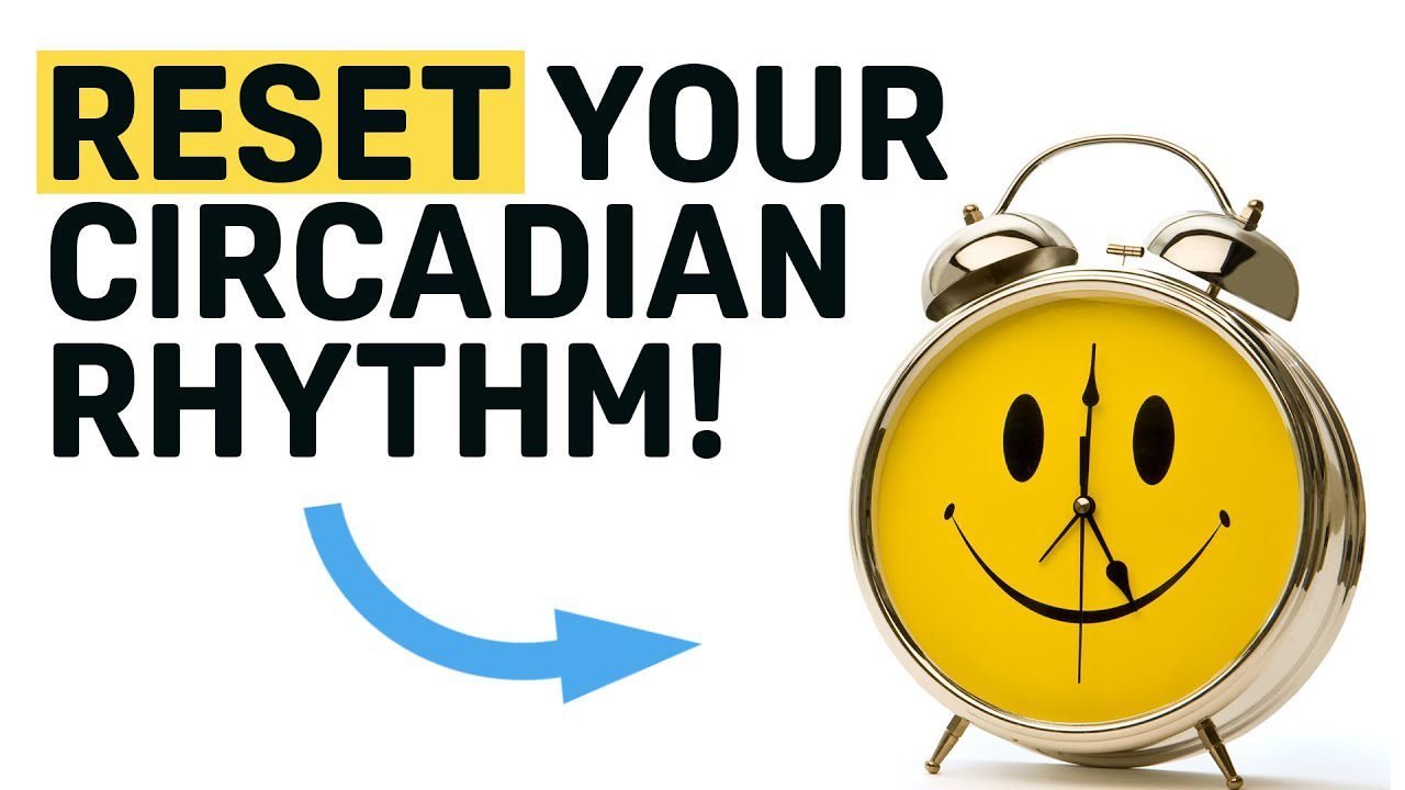 A naturally alert person works at a desk without needing caffeine for energy.