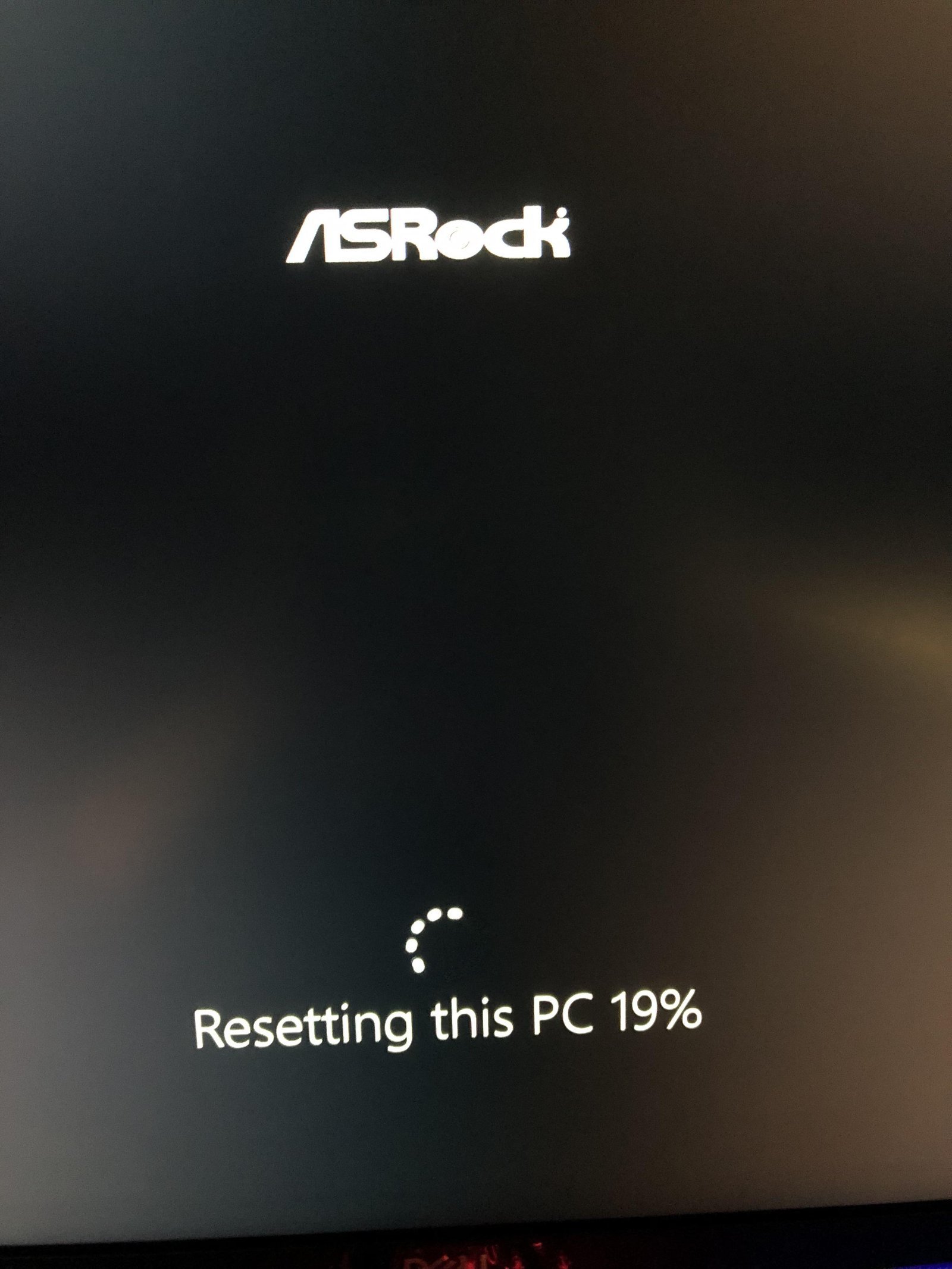 A clean computer desk with all peripheral devices unplugged to prevent reset errors.